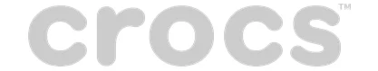 Crocs brand logo featuring bold, rounded grey typography with a trademark symbol.