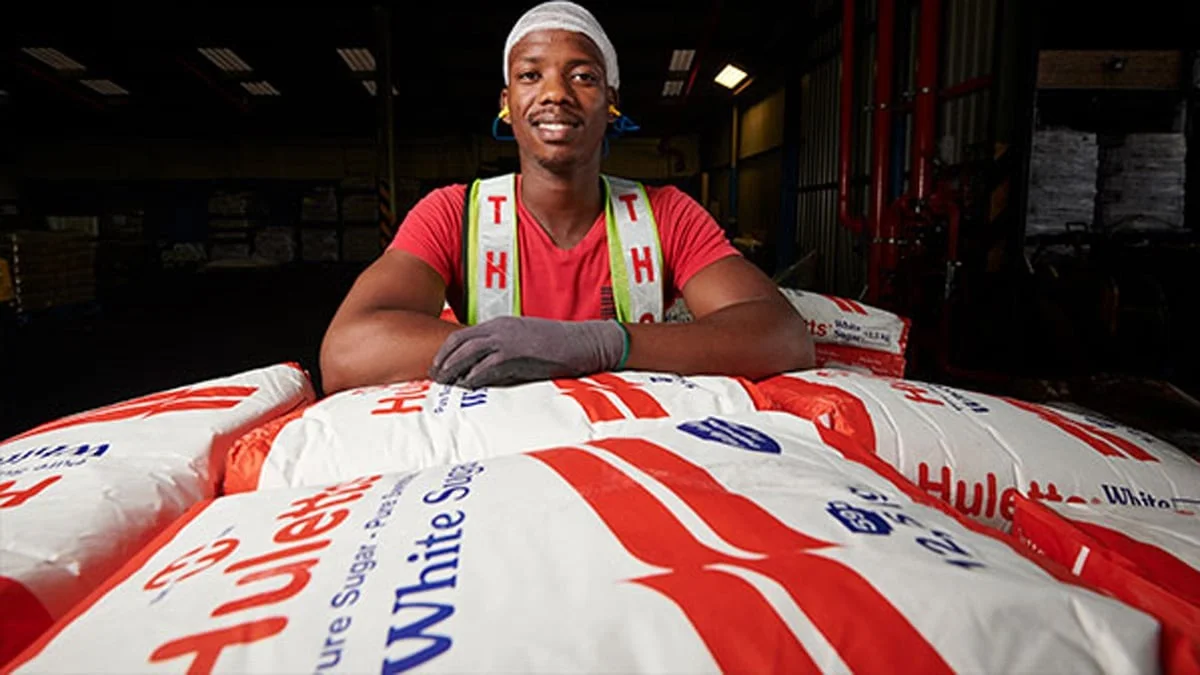 The corporate logo or a professional image of a Tongaat Hulett sugar mill, such as Maidstone, Amatikulu, or Felixton, representing a historic 134-year-old South African sugar producer. The image symbolizes a heritage business that has been a cornerstone of the KwaZulu-Natal economy since the 1800s.